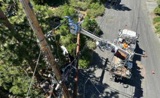 Why does Liberty replace electrical poles?